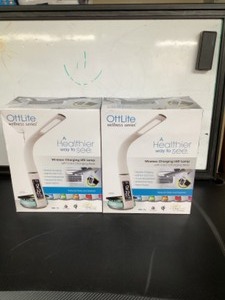 lot 69 image: 2 OttLite Wellness Series LED Desk Lamps with Clock, Color Changing Base, and Wireless Charging Station (White)