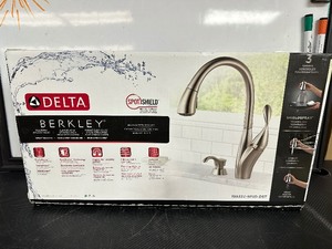 lot 83 image: Delta Berkley Single Handle Pull Down Kitchen Faucet with MagnaTite and Soap Dispenser