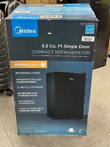 lot 15 image: Midea Compact Refrigerator, 3.3 cu ft, Black
