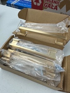 lot 141 image: 10 Pack Sapphire Hexa Series 5 in. (128 mm) Center-to-Center Modern Gold Cabinet Handle Pull 6 Total Length