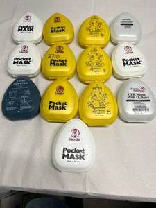 lot 66 image: Lot Of New Laerdal Pocket Masks and Moore Medical CPR Mask with O2 Inlet