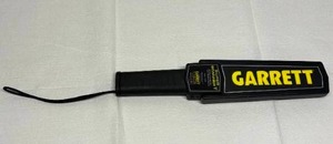 lot 139 image: Garrett Hand-Held Metal Detector with Super Scanner V Vibrating or Audible Alarm - In Great Condition