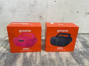 lot 108 image: LOT OF 2 Onn. Portable CD Boombox with Digital FM Radio