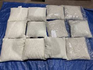 lot 751 image: LOT OF 12 Textured Woven Cotton Square Throw Pillows - Room Essentials