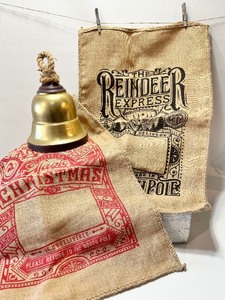 lot 126 image: Pair of WONDERSHOP Holiday BURLAP SACKS and Large Bell