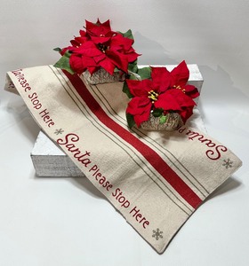 lot 134 image: Pair of Faux Potted POINSETTIAS and CANVAS Holiday Table Runner