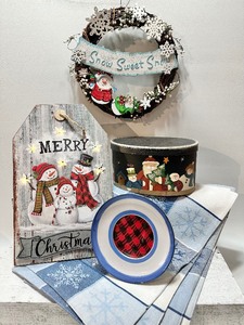 lot 136 image: HOLIDAY SNOWMAN Wreath, Sign, Snowflake Placemats, Ceramic Frame and Santa Box