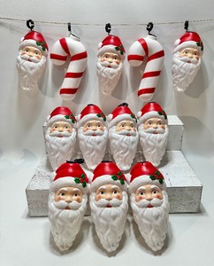 lot 144 image: VINTAGE 1995 EMPIRE Candy Cane and Santa BLOW MOLD Light Covers