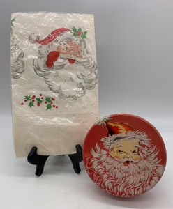 lot 49 image: Vintage Santa MRS STEVENS Cookie Candy Tin and Paper Santa Table Cloth