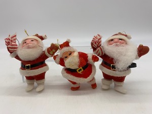 lot 81 image: Vintage PLASTIC and FLOCKED Santa Ornaments - QTY 3