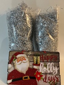lot 419 image: Extra Large Bags of Tinsel and Happy Holly Days Sign