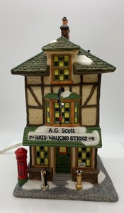 lot 484 image: DEPT 56 Dickens Village Series, A.G. Scot Hats and Walking Sticks House