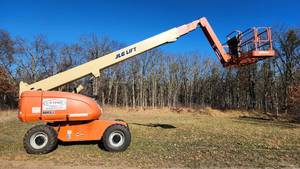 lot 001 image: JLG 660SJ 4x4 Telescopic Boom Lift