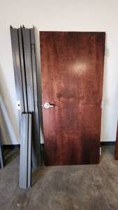 lot 017 image: 30 x 68 Left-Hand Swing Solid Core Wood Door with Metal Frame and Hardware