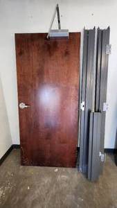 lot 018 image: 30 x 68 Left-Hand Swing Solid Core Wood Door with Metal Frame and Hardware
