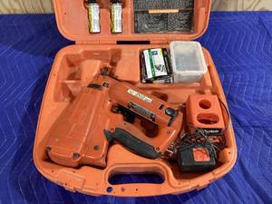 lot 035 image: Paslode IM250A Cordless Finish Nailer with Accessories And Case