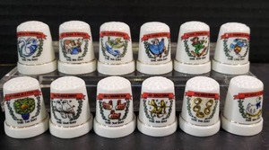 lot 33 image: Twelve Days of Christmas Thimbles