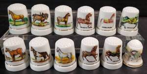 lot 36 image: Twelve Horse Themed Thimbles