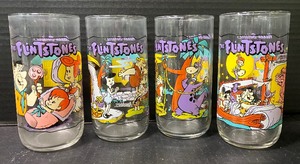 lot 42 image: LOT of Four Vintage Flintstones Glasses First Thirty Year Collection