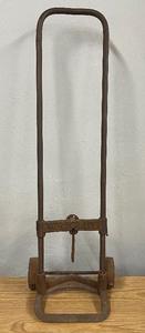 lot 75 image: Antique Cast Iron Wrigley Two-Wheel Cart