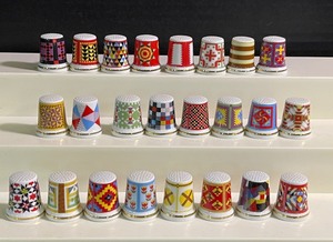 lot 82 image: LOT of Twenty-Four Quilt Patterned Thimbles