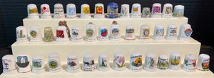 lot 111 image: Forty Tourist and State Thimbles