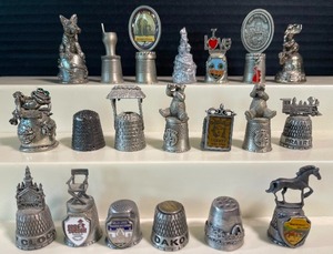 lot 118 image: Twenty Pewter Thimbles