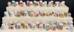 lot 127 image: Sixty Porcelain Floral Themed Thimbles