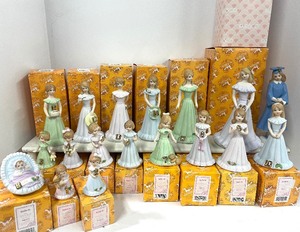 lot 22 image: Vintage Enesco 1980s Growing Up Birthday Girls Collection Lot of 18