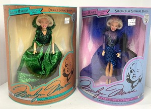 lot 27 image: Marilyn Monroe Collectors Series Dolls by DSI Emerald Evening and Spectacular Showgirl