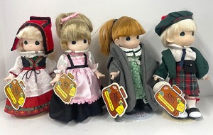 lot 57 image: Precious Moments Children of the World Dolls - Norway, Sweden, Ireland, Scotland