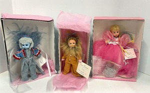 lot 61 image: 2000 Winged Monkey  1997 Cowardly Lion  2001 Glinda the Good Witch Wizard of Oz Madame Alexander Dolls