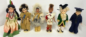 lot 66 image: Lot of 6 International Sleepy Eye Dolls Plastic with Stands