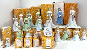 lot 75 image: Enesco Growing Up Birthday Girls Figurines No 17 or 18