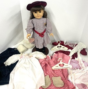 lot 79 image: Samantha Parkington Vintage American Girl Doll with Stand and Locket and Clothing