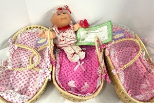 lot 80 image: Cabbage Patch Doll and Three Rattan Carrying Cases new with tags