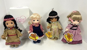 lot 84 image: Children of the World Precious Moments Dolls with Stands United States Dolls