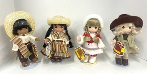 lot 97 image: Mexico Boy and Girl, Alaska, Australia Children of the World Dolls by Precious Moments