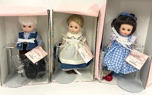 lot 134 image: Dorothy, Auntie Em and Uncle Henry Wizard of Oz Madame Alexander Dolls