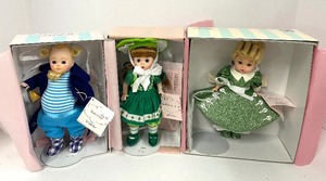 lot 135 image: Town Crier, Emerald City Townswoman and Hairdresser Wizard of Oz Madame Alexander Dolls Lot of 3