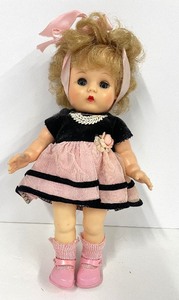 lot 152 image: Vintage Vinyl Fashion Doll with Pink and Black Dress, Sleepy Eyes