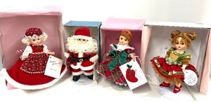 lot 161 image: Madame Alexander Christmas Dolls 1993 Santa and Mrs. Claus, 1995 Christmas Eve 2005 Tidings of Joy Ballerina