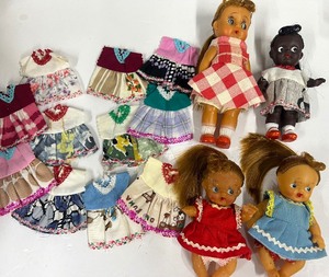 lot 53 image: Unmarked Baby Dolls Japan with assortment of Adorable Handmade outfits 3-4 dolls