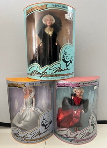 lot 13 image: DSI 1993 Marilyn Monroe Collectors Series Dolls Lot of 3 Dolls NIB