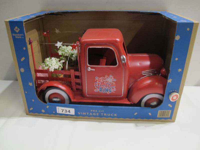 lot 750 image: Members Mark Pre-Lit Freedom Ring Red Vintage Truck