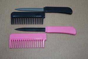 lot 30 image: 2 Hair Comb Knives