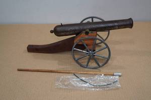 lot 158 image: Vintage Cast Iron Black Powder Cannon and Ram Rod