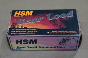 lot 209 image: 50 HSM Bear Load 357 Mag 180 Gr RN FP Ammo