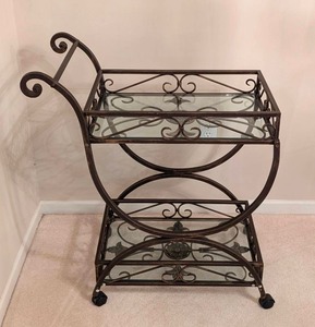 lot 26 image: Stylish Dark Bronze and Glass Topped Rolling Bar Cart