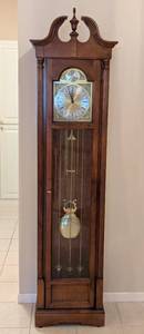 lot 21 image: Howard Miller Grandfather Clock